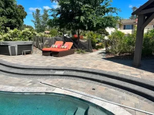 Discover the Benefits of Paver Pool Decking at Business Space